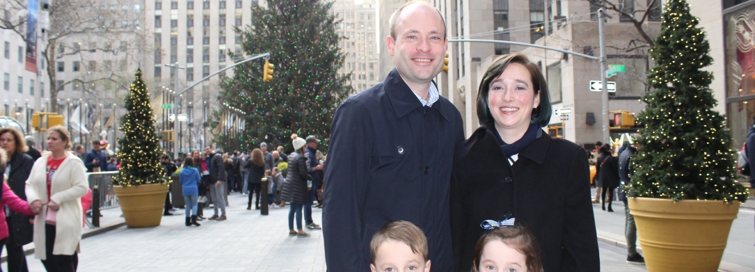 Carroll alumni family photographed outside the NYC Mass and Brunch event of 2017