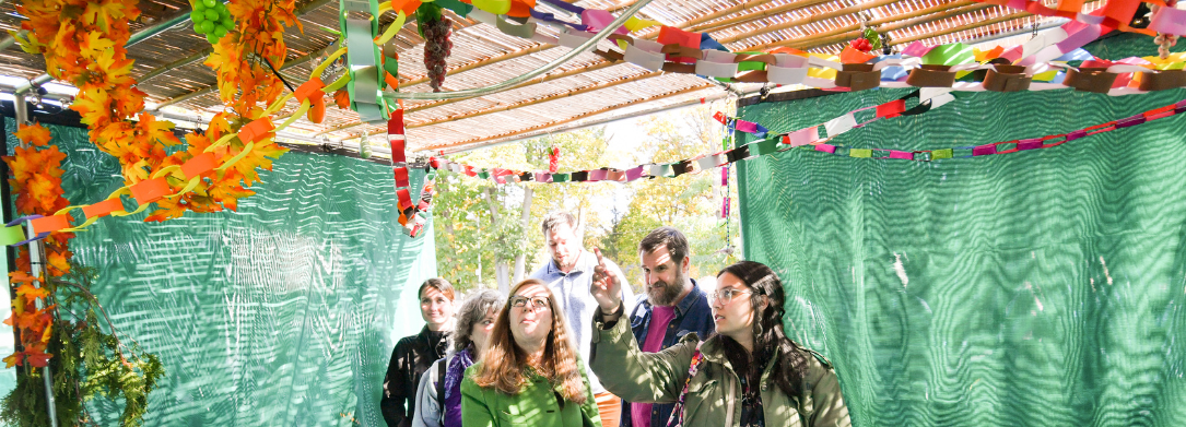 Participants Visiting Sukkah