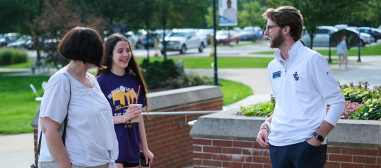 student meeting with admission counselor